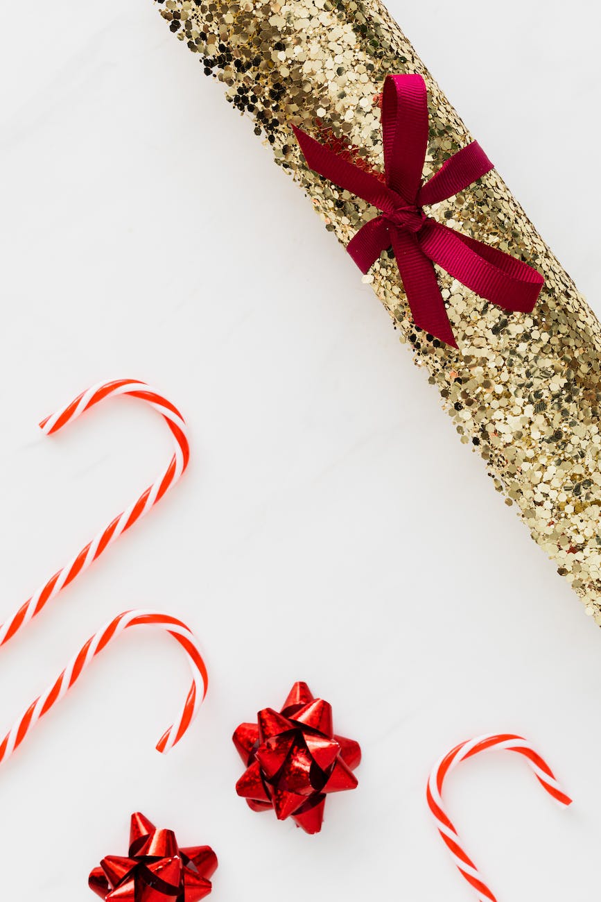 red and white ribbon on brown and white floral textile